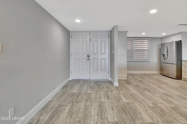 foyer featuring light hardwood / wood-style floors