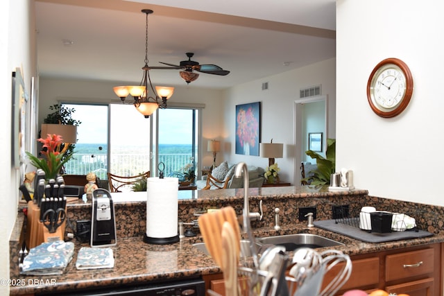 dining space with visible vents and ceiling fan