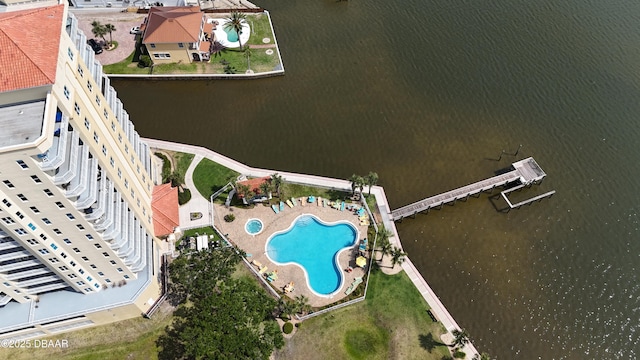 birds eye view of property featuring a water view