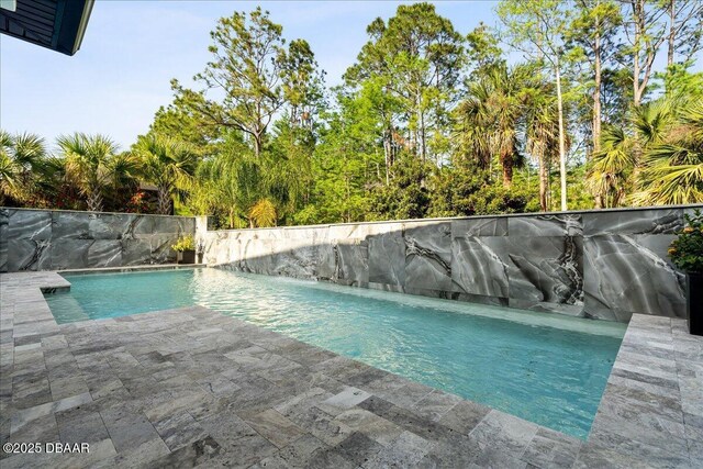 634 Woodbridge Dr, Ormond Beach, FL 32174 - view of swimming pool featuring a patio area