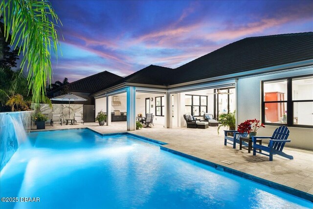 634 Woodbridge Dr, Ormond Beach, FL 32174 - view of swimming pool featuring a patio area and outdoor lounge area