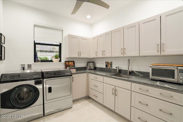 634 Woodbridge Dr, Ormond Beach, FL 32174 - washroom featuring separate washer and dryer and a ceiling fan