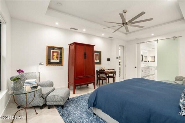 634 Woodbridge Dr, Ormond Beach, FL 32174 - bedroom with a tray ceiling, recessed lighting, connected bathroom, and ceiling fan