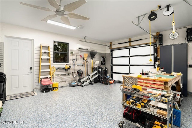 634 Woodbridge Dr, Ormond Beach, FL 32174 - garage featuring a wall mounted AC and a ceiling fan