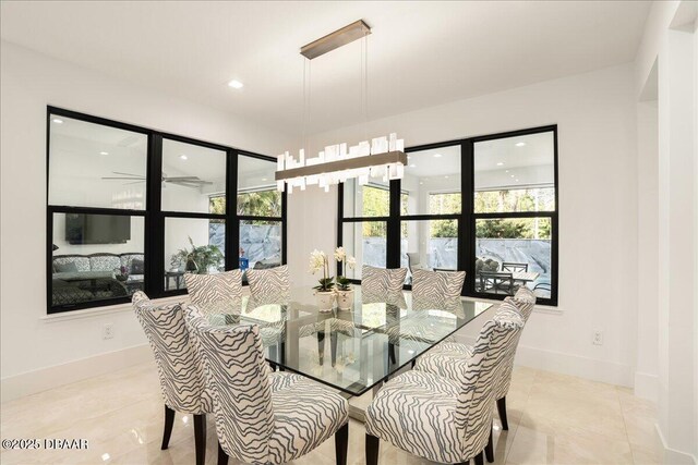 634 Woodbridge Dr, Ormond Beach, FL 32174 - dining room with healthy amount of natural light, recessed lighting, and baseboards