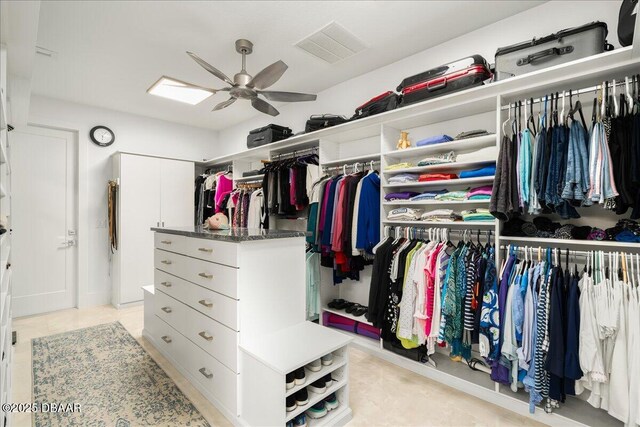 634 Woodbridge Dr, Ormond Beach, FL 32174 - spacious closet with ceiling fan