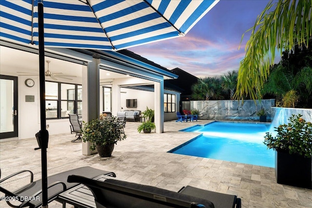 634 Woodbridge Dr, Ormond Beach, FL 32174 - view of pool featuring a ceiling fan, a patio area, and outdoor lounge area