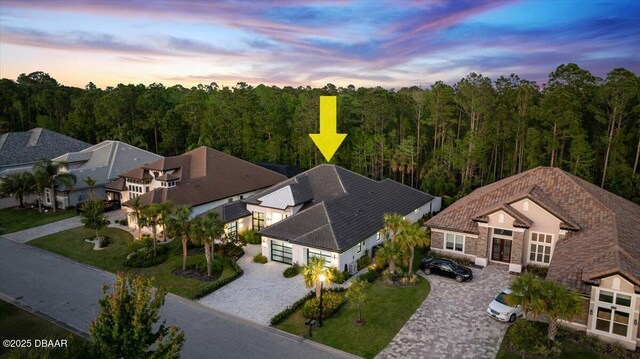 634 Woodbridge Dr, Ormond Beach, FL 32174 - aerial view of property and surrounding area featuring a forest