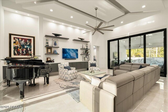 634 Woodbridge Dr, Ormond Beach, FL 32174 - living area featuring ceiling fan, a towering ceiling, recessed lighting, and beam ceiling