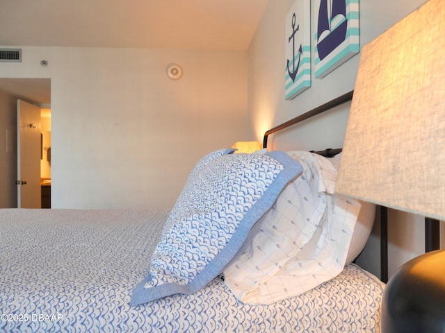 bedroom with visible vents