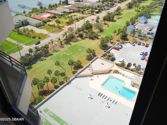 bird's eye view featuring a water view and view of golf course