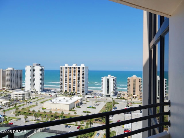 balcony featuring a water view