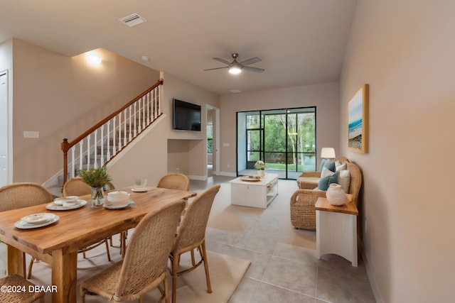 dining space featuring ceiling fan