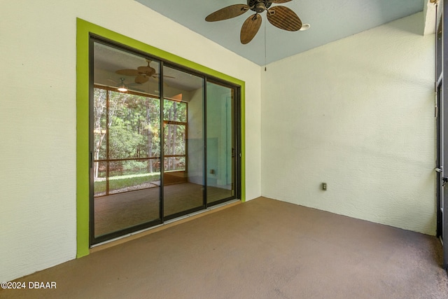 carpeted empty room with ceiling fan