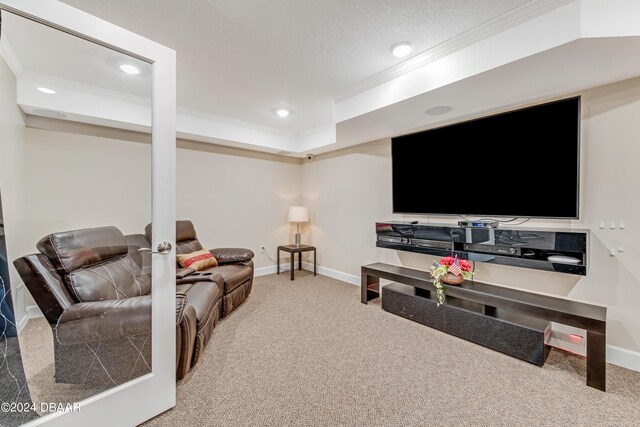 3797 S Atlantic Ave Unit 404, Daytona Beach, FL 32118 - carpeted living room with ornamental molding, baseboards, recessed lighting, and a raised ceiling