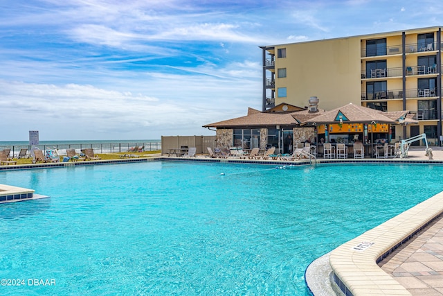 view of swimming pool with a patio area