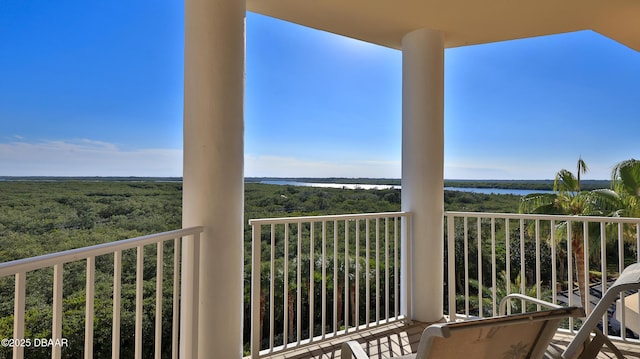 balcony featuring a water view