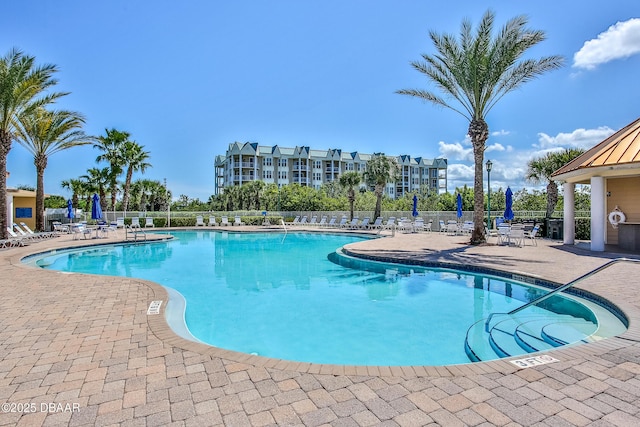 view of pool featuring a patio