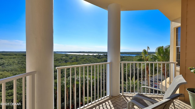 balcony featuring a water view