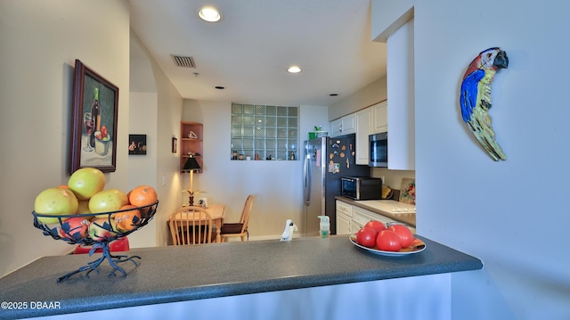 kitchen with white cabinetry