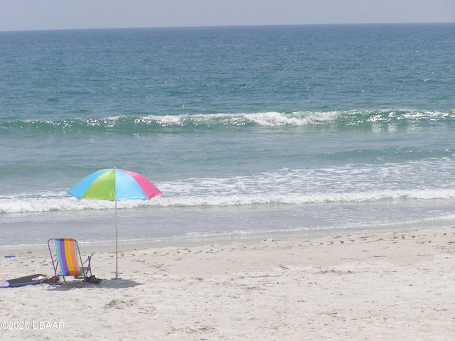 view of water feature featuring a beach view