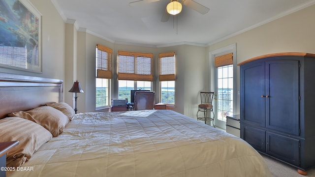 bedroom with ceiling fan and crown molding