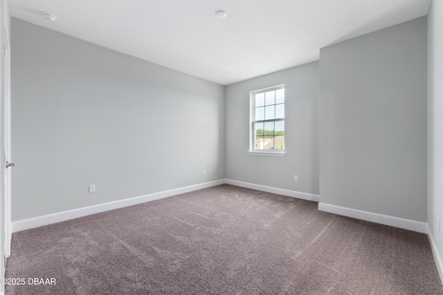 unfurnished room with carpet