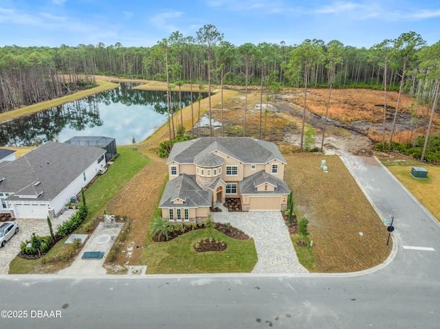 birds eye view of property featuring a water view