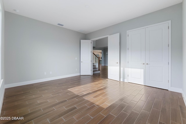 unfurnished bedroom with a closet