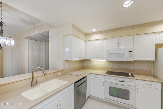 4624 Harbour Village Blvd Unit 4204, Ponce Inlet, FL 32127 - kitchen featuring white cabinets, a sink, and white appliances