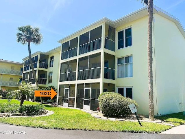 717 S Beach St Unit 102C, Daytona Beach, FL 32114 - view of apartment building / complex