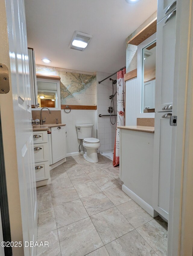 717 S Beach St Unit 102C, Daytona Beach, FL 32114 - bathroom with vanity and curtained shower