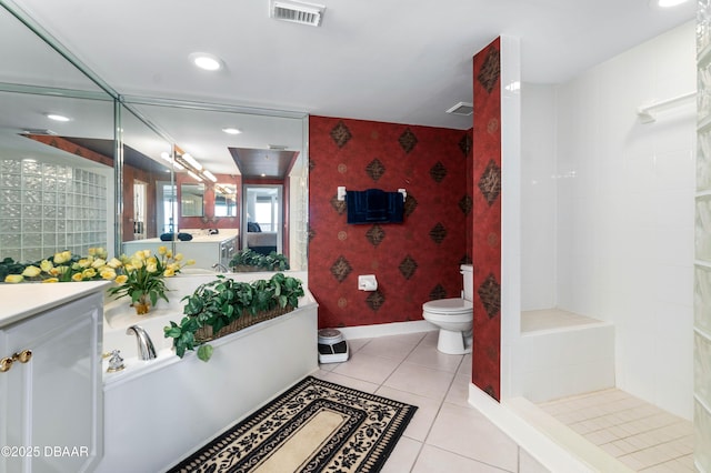 bathroom with visible vents, wallpapered walls, toilet, baseboards, and tile patterned floors