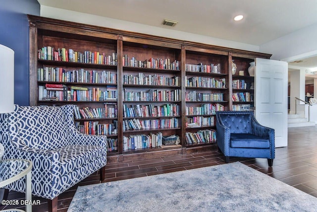 sitting room with wood finish floors, visible vents, and recessed lighting