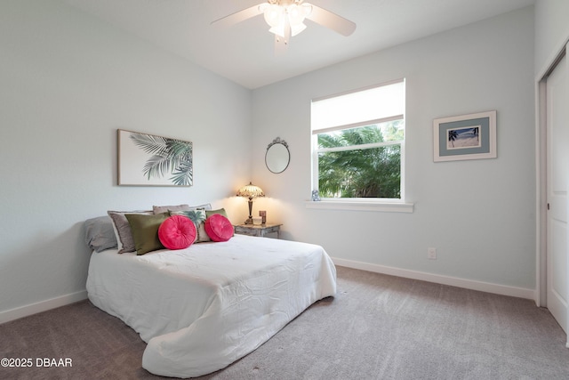 bedroom featuring ceiling fan and carpet flooring