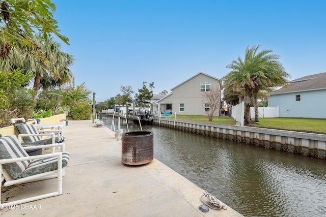 dock area with a water view