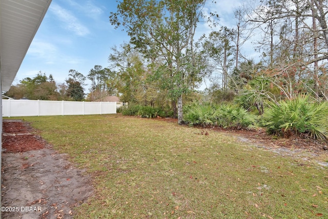 view of yard featuring fence