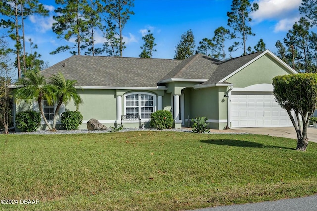 single story home with a garage and a front yard