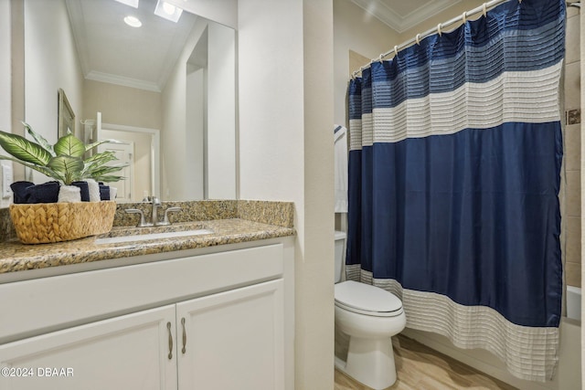 bathroom featuring vanity, hardwood / wood-style flooring, ornamental molding, and curtained shower