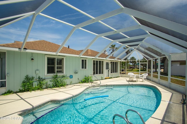 33 Sea Harbor Dr E, Ormond Beach, FL 32176 - outdoor pool featuring a patio area and glass enclosure