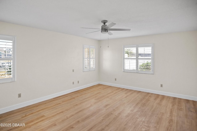 33 Sea Harbor Dr E, Ormond Beach, FL 32176 - spare room featuring wood finished floors, a ceiling fan, and baseboards