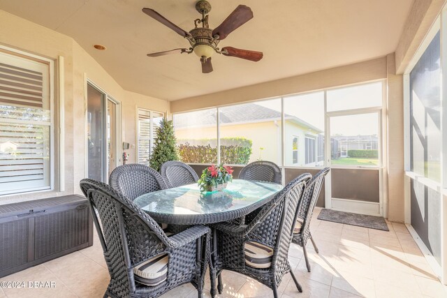 sunroom / solarium with ceiling fan