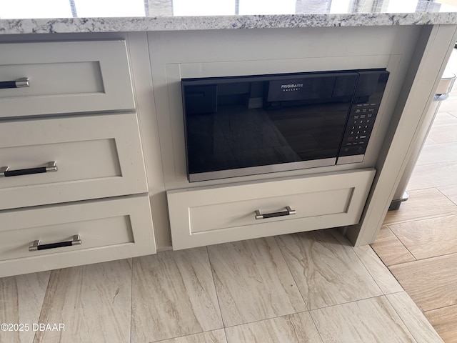 interior details featuring light stone counters