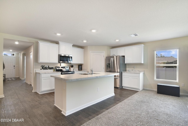 kitchen featuring dark wood-type flooring, white cabinetry, and appliances with stainless steel finishes