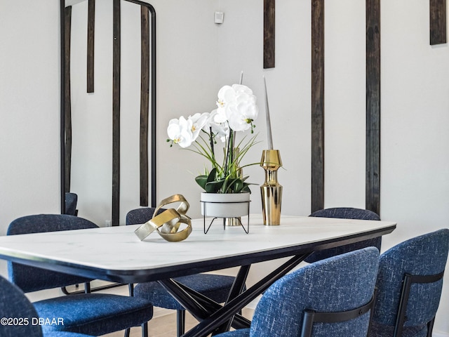 dining space featuring hardwood / wood-style flooring