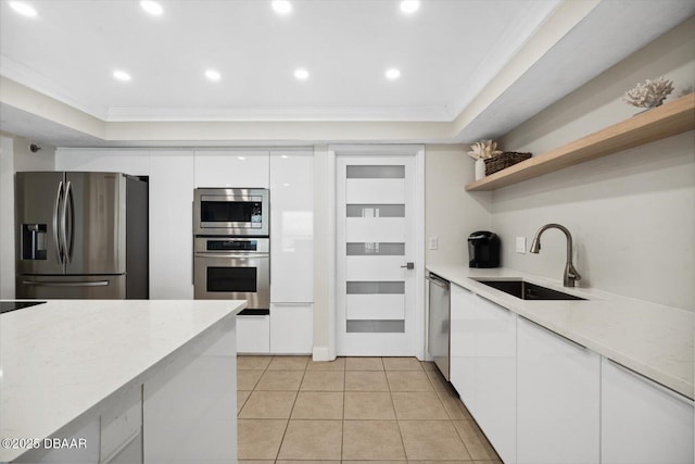 2615 S Atlantic Ave Unit 7H, Daytona Beach, FL 32118 - kitchen featuring stainless steel appliances, open shelves, white cabinetry, modern cabinets, and ornamental molding