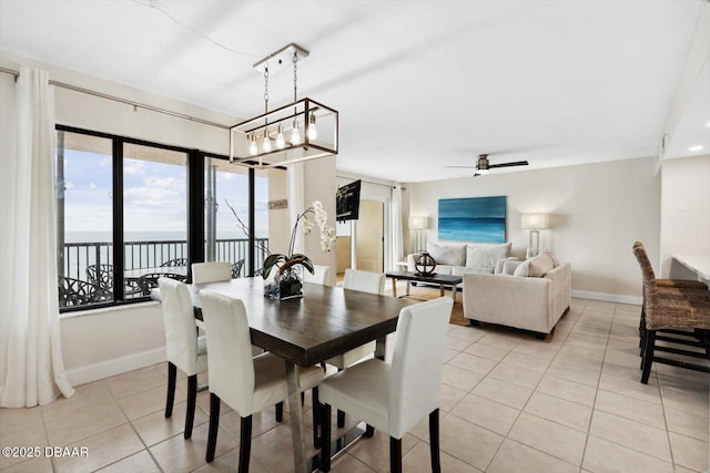 2615 S Atlantic Ave Unit 7H, Daytona Beach, FL 32118 - dining room with light tile patterned floors and ceiling fan