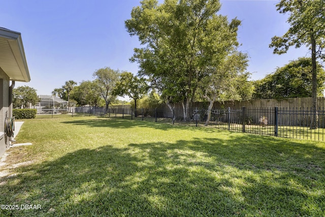 view of yard with a fenced backyard