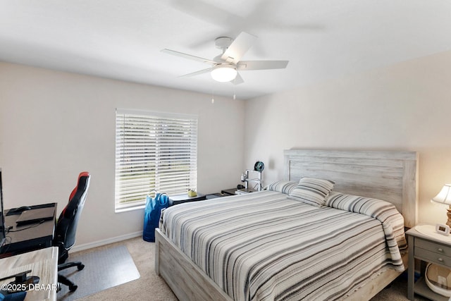 bedroom featuring carpet floors, baseboards, and ceiling fan