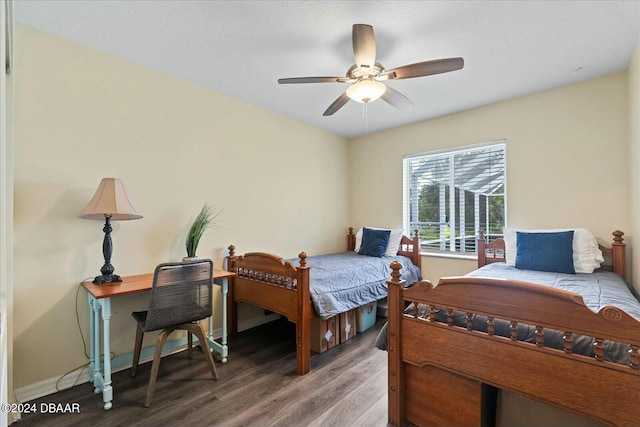 bedroom featuring ceiling fan and wood-type flooring